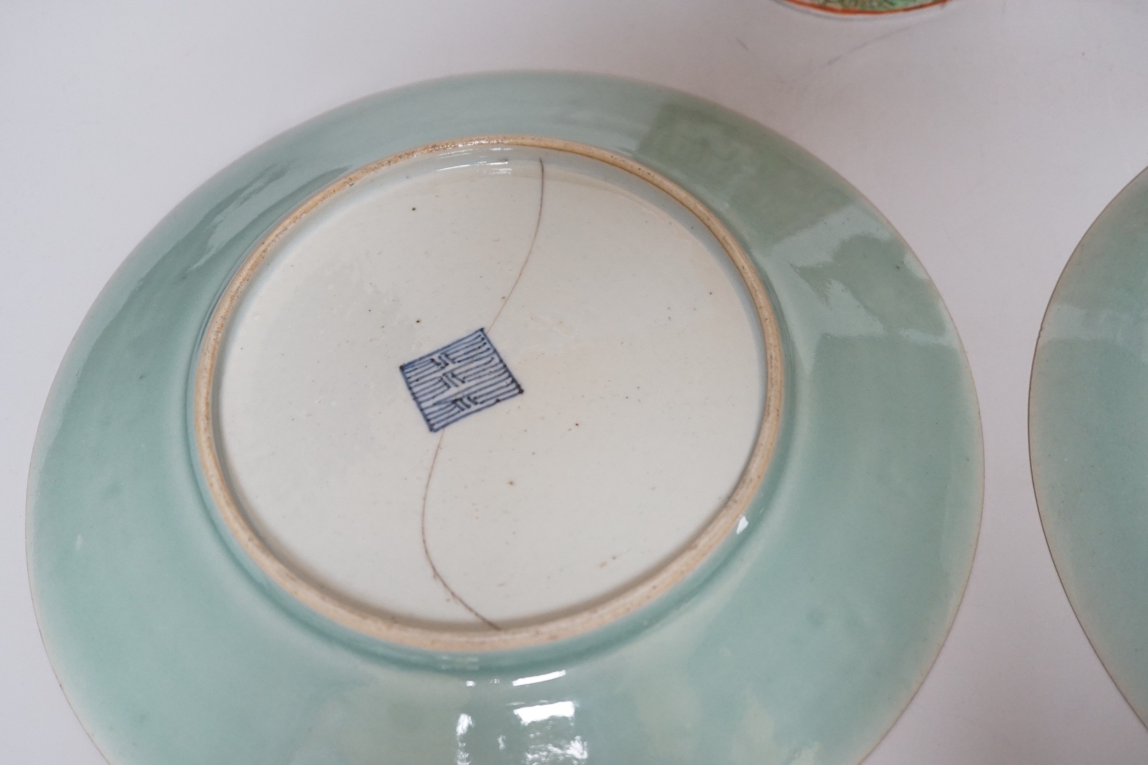 A pair of Chinese celadon ground famille rose plates, a Chinese famille rose tea pot and a bronze censer, plates 26cms diameter